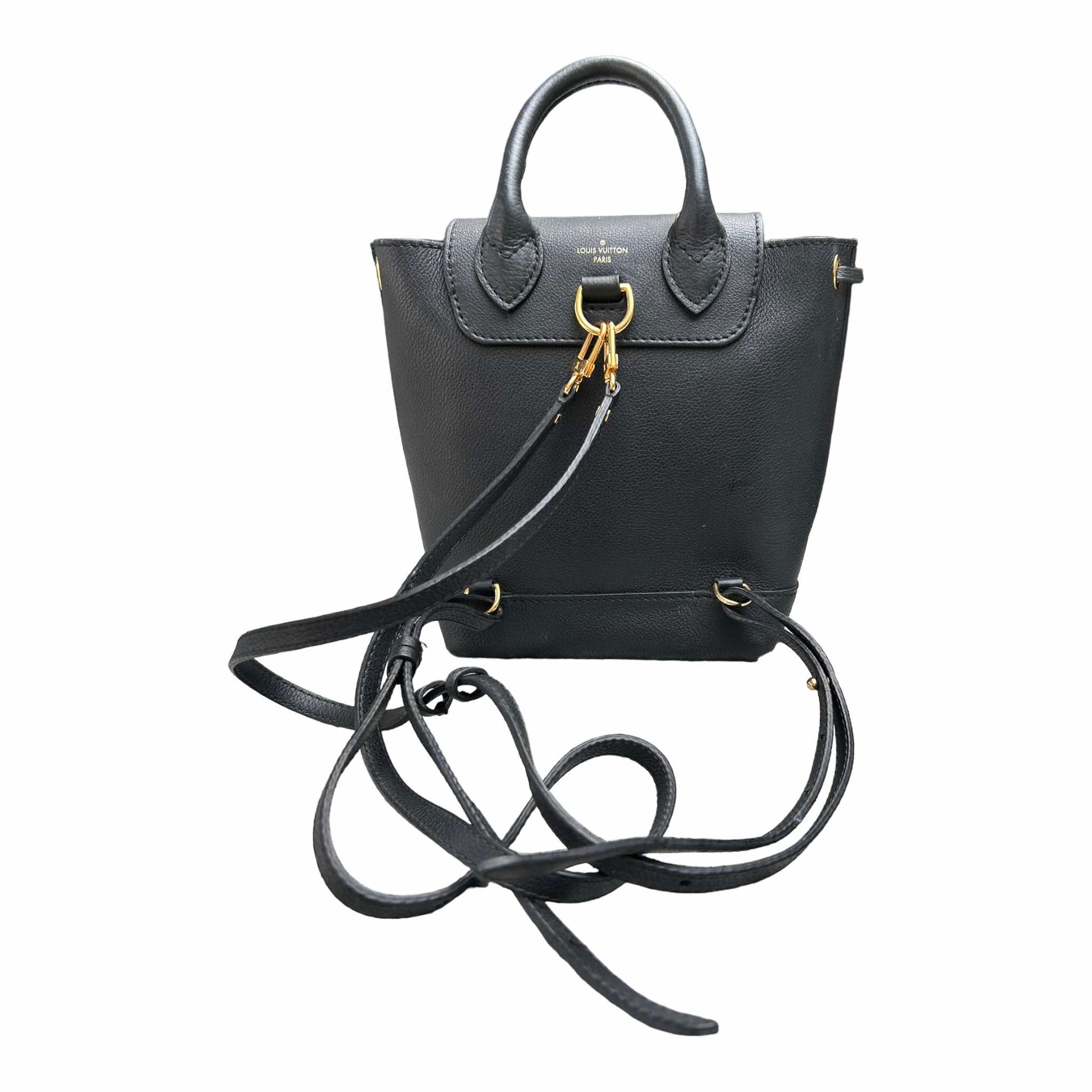 lockme mini backpack louis vuitton Pre-Loved Louis Vuitton Mini Lock Me Backpack