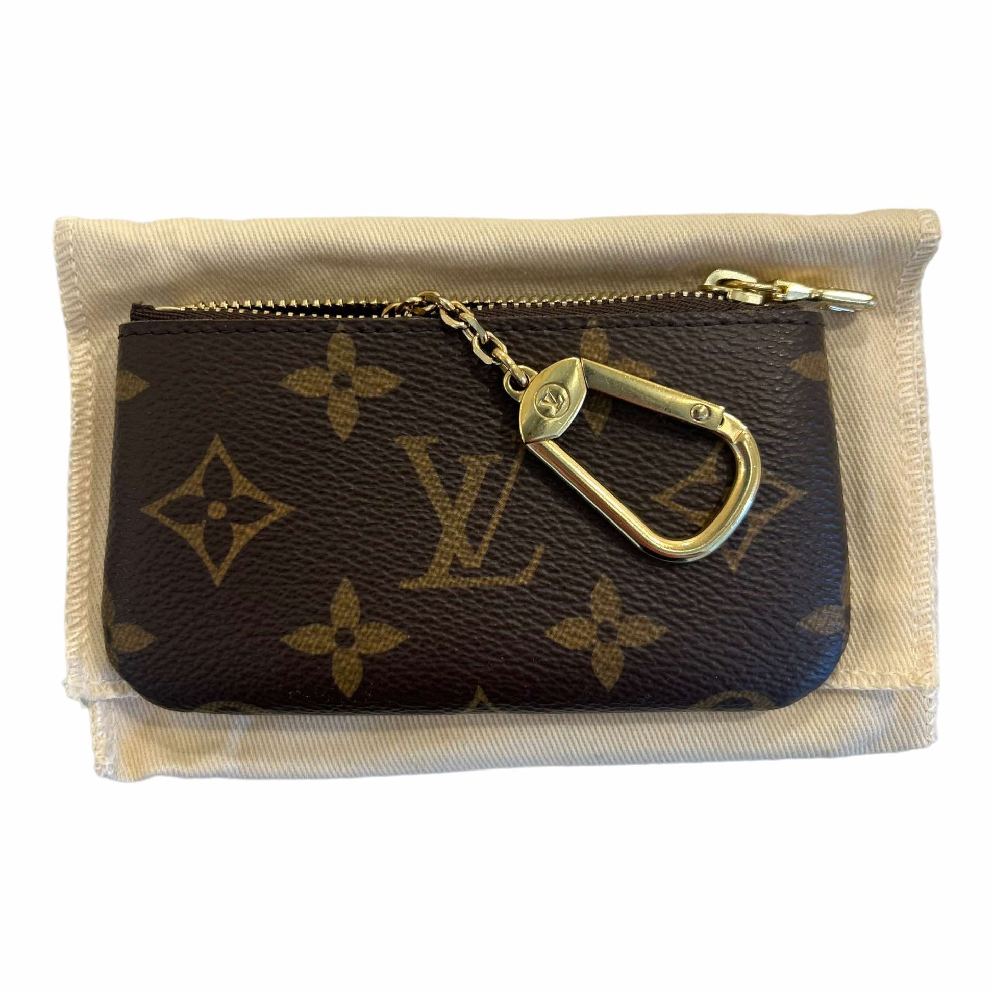 Louis Vuitton M62650 Key Pouch Monogram  Louis vuitton key pouch, Louis  vuitton, Louis vuitton handbags crossbody